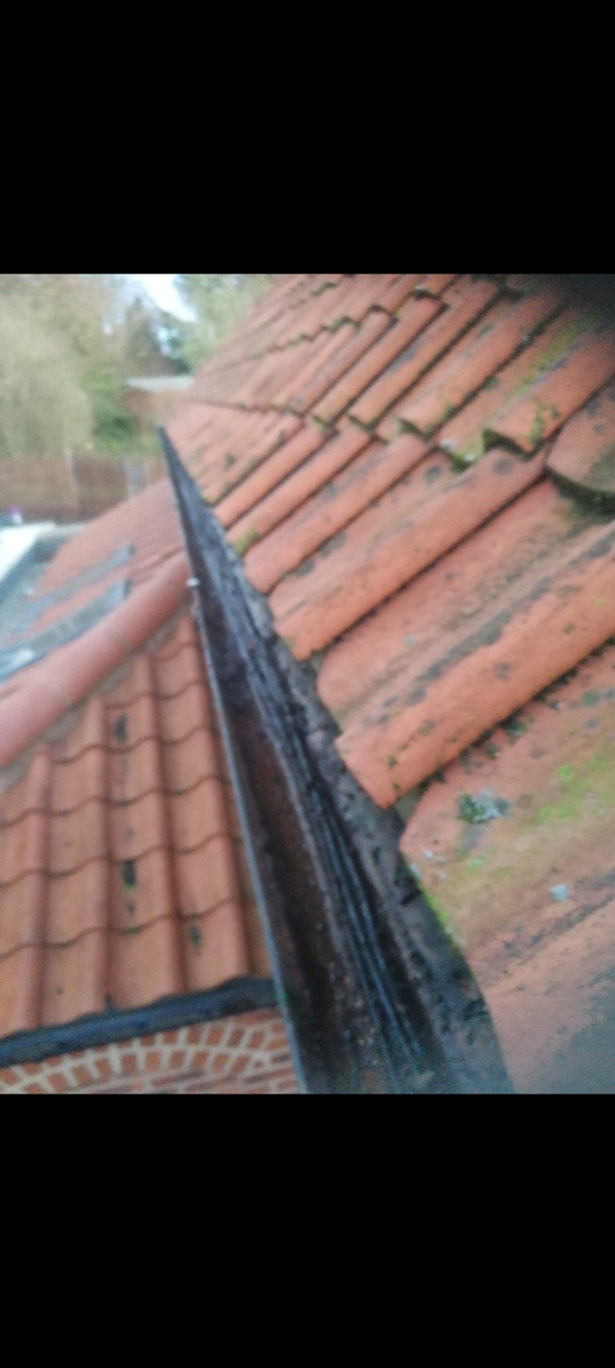 Valley gutter cleared of moss and debris by RMS