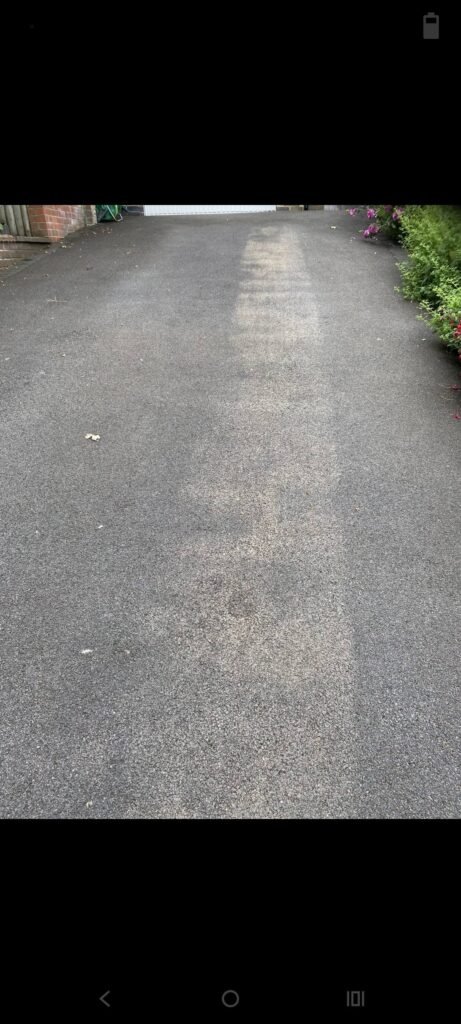 Ingrained sand marking a Ravenshead tarmac driveway before RMS treatment